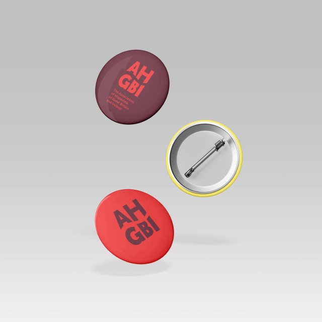 A mockup of 3 badges with AHGBI logo on them