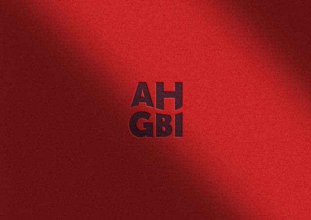 The AHGBI logo on a red background